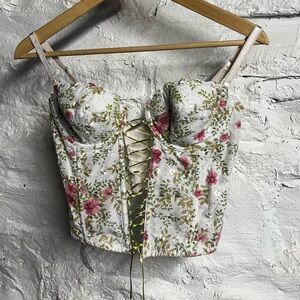 Floral corset top with green laces